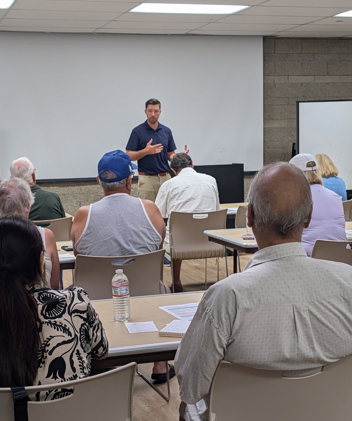 Chris Frasca presenting to a seated audience at a recent Medicare workshop